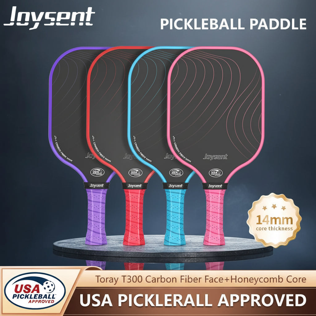 Four pickleball paddles with different colored handles on a dark background, featuring the Joysent brand.